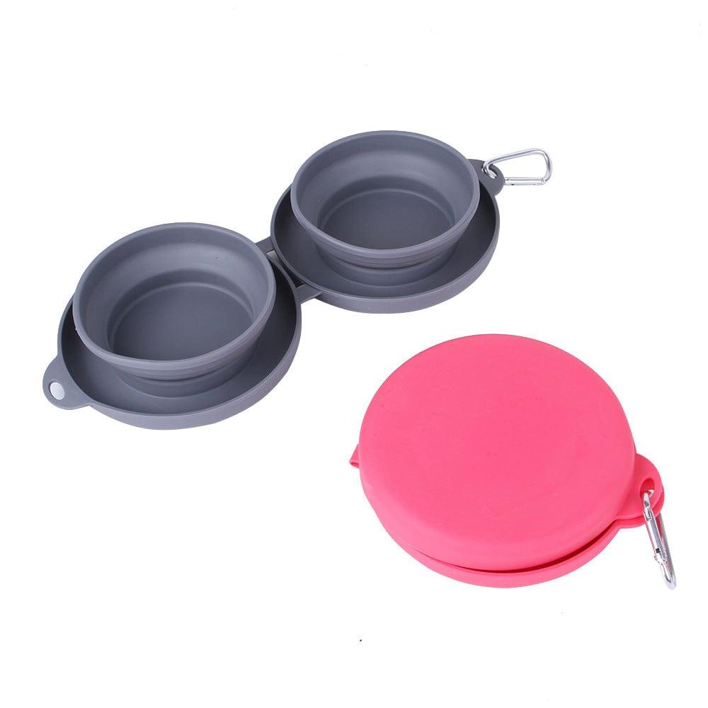 Pink and gray foldable double bowl for pets with a secure plastic lid
